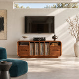 Open vinyl storage meets smooth drawers in this solid wood TV stand for organized media
