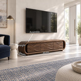 Refined TV cabinet in solid wood with soft rounded ends and sculpted drawer faces
