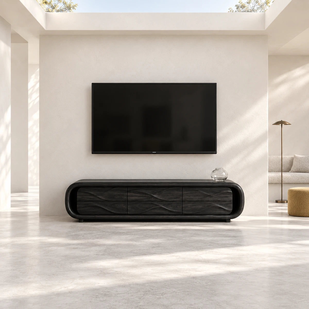 Living room media console in solid wood with wave-detail drawers and rounded sides
