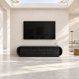 Living room media console in solid wood with wave-detail drawers and rounded sides
