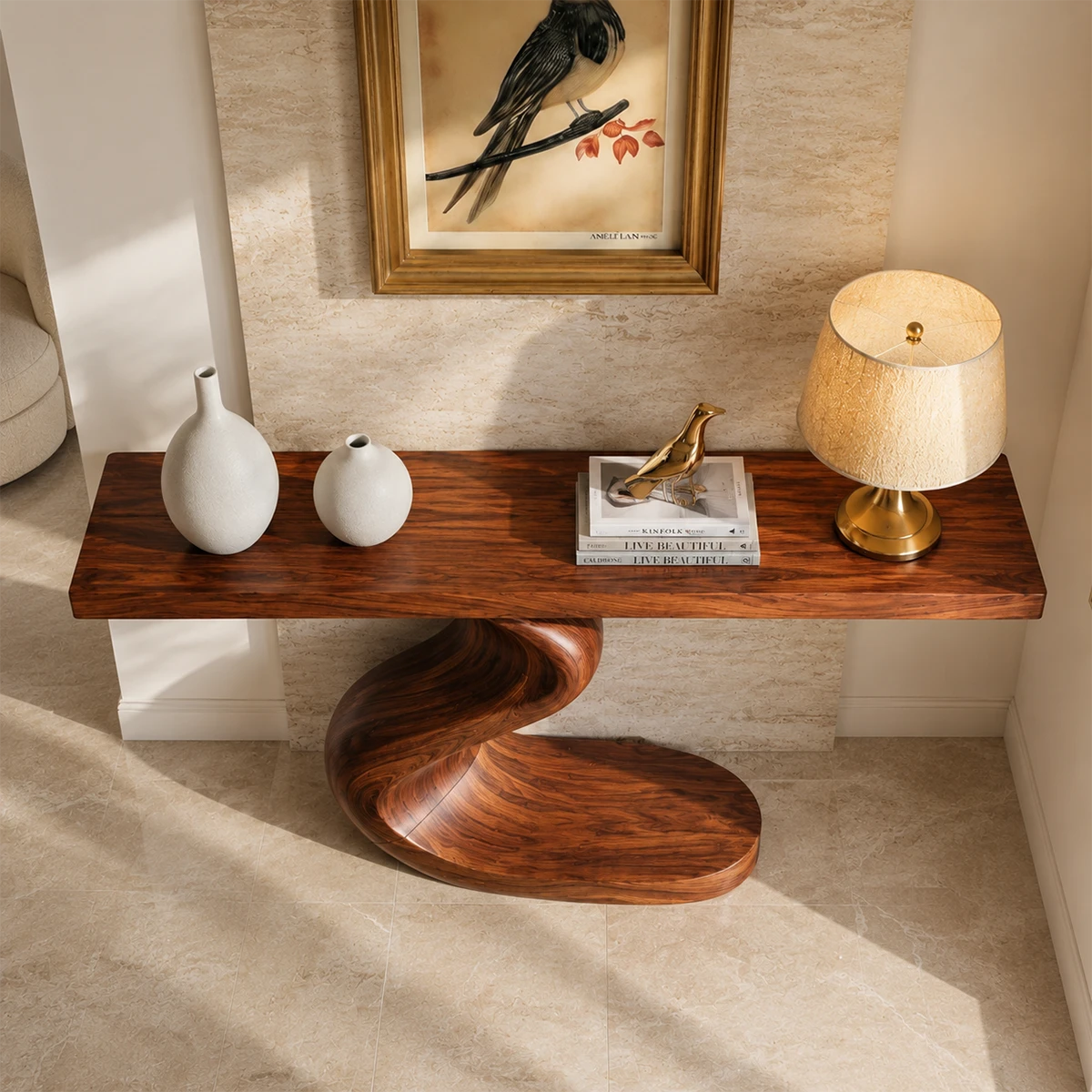 Narrow console table with sculpted S shaped base for elegant foyer decor styling