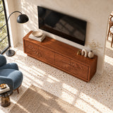 Decorative TV cabinet in solid wood with scenic relief doors and broad top surface
