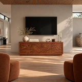 Wide entertainment console in solid wood with textured landscape carving panels base
