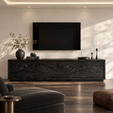 Living room TV console in solid wood with decorative relief doors and storage base
