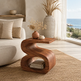 Statement end table with open lower shelf and bold organic lines in a minimalist room