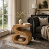 Luxury side table with flowing supports and compact storage in a bright living interior