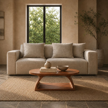 Solid wood coffee table with bold oval tabletop and continuous curved support base