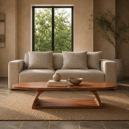 Organic shape coffee table with smooth edges and sculptural base for cozy modern spaces