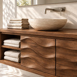 Minimalist bath vanity in natural solid wood with carved doors and open shelving
