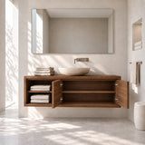 Elegant floating vanity in natural solid wood with open cubbies and concealed storage