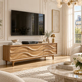 Statement media console with wave inspired fronts creates a distinctive room feature