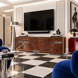 Entertainment console in natural solid wood with carved wave pattern doors design