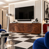 Elegant entertainment center in natural solid wood with carved panels below storage