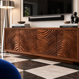 Sleek TV console in natural solid wood with flowing door detail and storage space