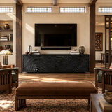 Low TV stand in natural solid wood with four textured doors and wide profile style
