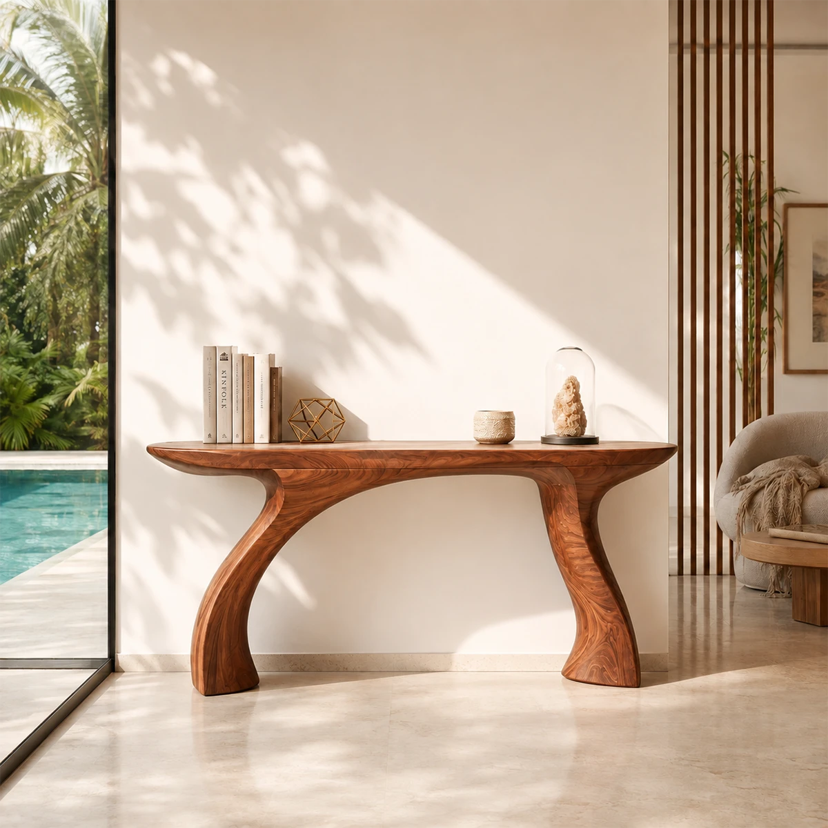 Contemporary console table showcases soft curves in a bright resort style room setting