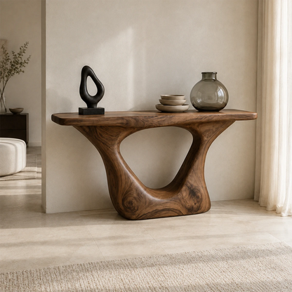 Entryway console table with an open sculpted base and sleek top for decor display