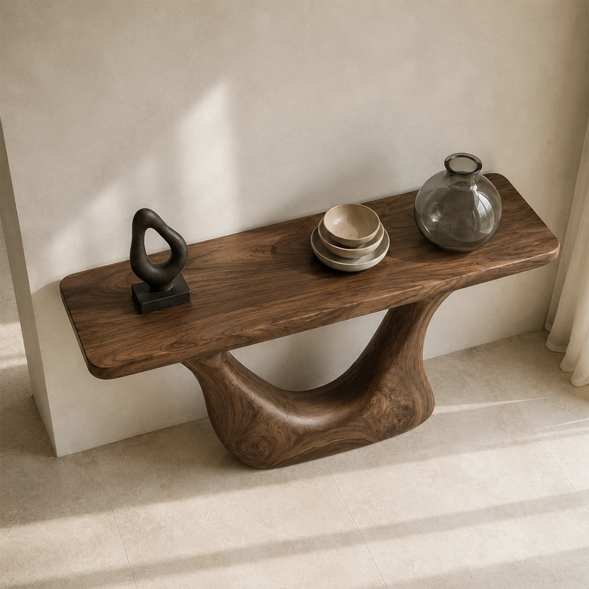 Narrow console table with a sculptural cutout frame for refined foyer decor styling