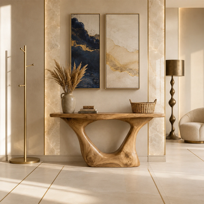 Modern accent console with an architectural base and clean styling near tall windows