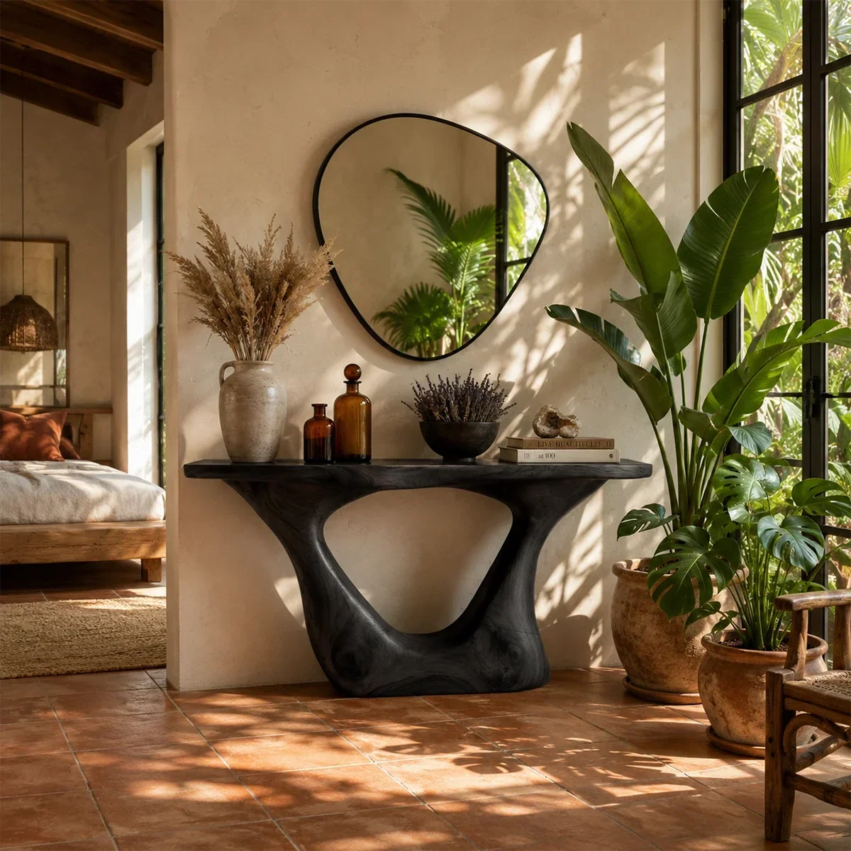 Curved console table displayed with decor in a bright luxury room with soft daylight