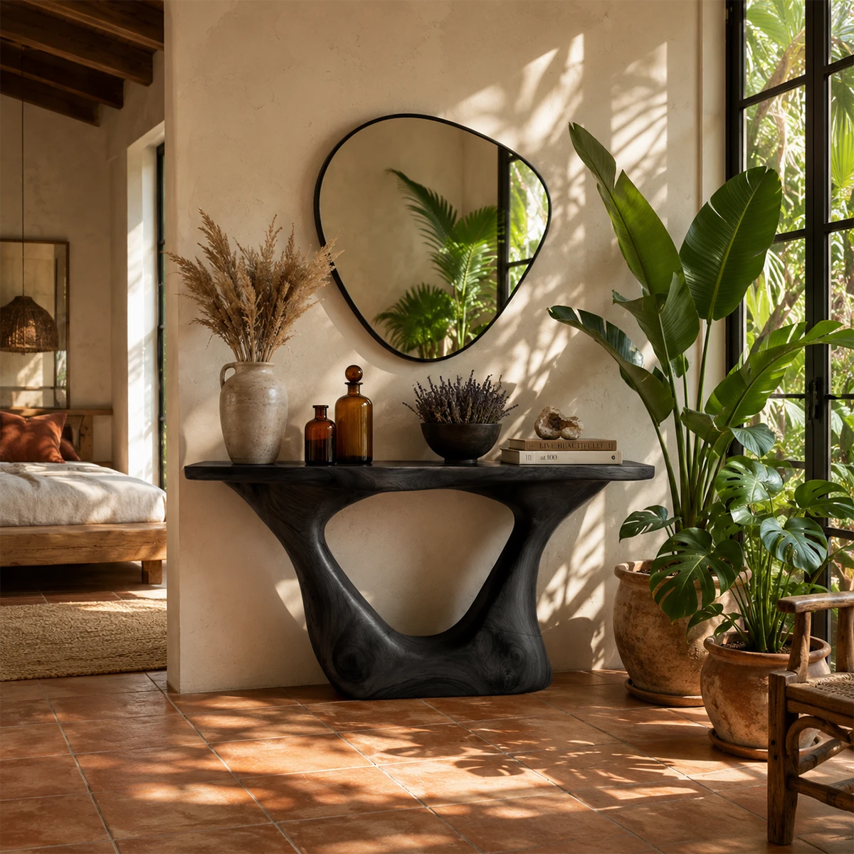 Curved console table displayed with decor in a bright luxury room with soft daylight