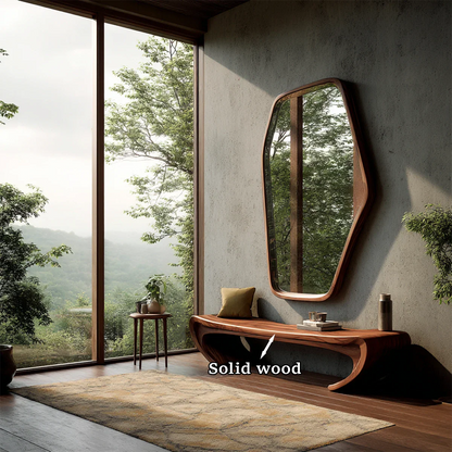 Japandi inspired entryway bench featuring sculptural form and warm walnut tone finish