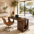 Executive writing desk with drawer storage and sculptural sides for daily work use