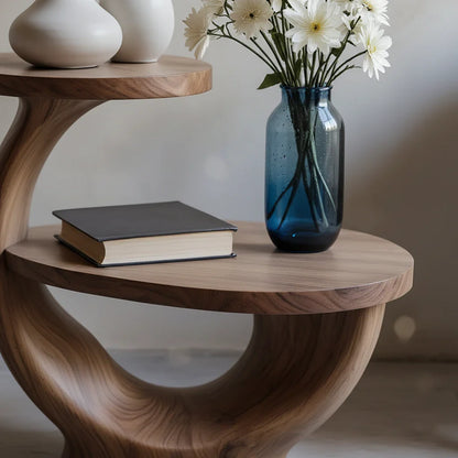Designed with a walnut tone finish, the end table highlights soft edges and flowing lines