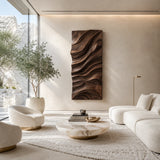 Textured wall art with sweeping sculptural details brings dimension to minimalist interiors