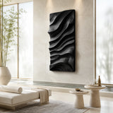 Artistic wall panel with flowing relief design creates a refined centerpiece for home decor