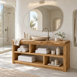 Wide open vanity in natural solid wood with organized cubbies for towels and essentials