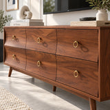 Modern TV console in solid wood with six drawers and clean brass ring pull detailing
