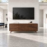 Sleek TV media stand in solid wood with six storage drawers and brass pull details