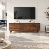 Living room TV stand in solid wood with broad storage drawers and slim tapered legs
