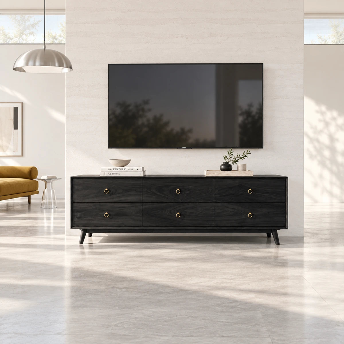 Minimalist TV cabinet in solid wood with ring pulls and spacious drawer organization
