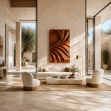 Above the sofa, this sculptural wall panel adds movement through layered flowing curves