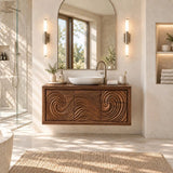 Decorative bathroom vanity in natural solid wood with deep relief curves across doors