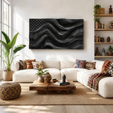 Broad wave relief shapes this artistic wall decor into a refined centerpiece for the room