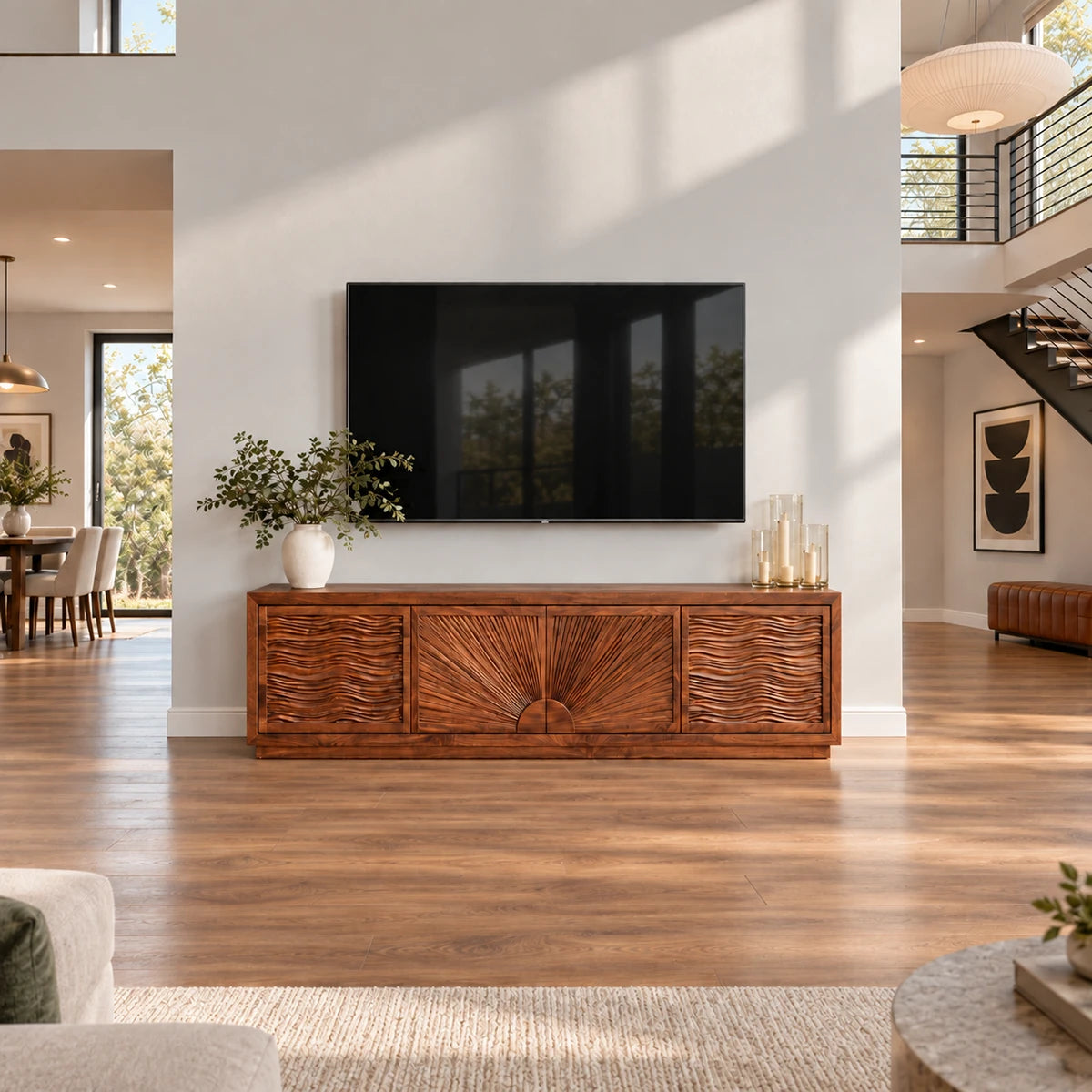 Functional entertainment unit in solid wood with carved wave doors and storage below
