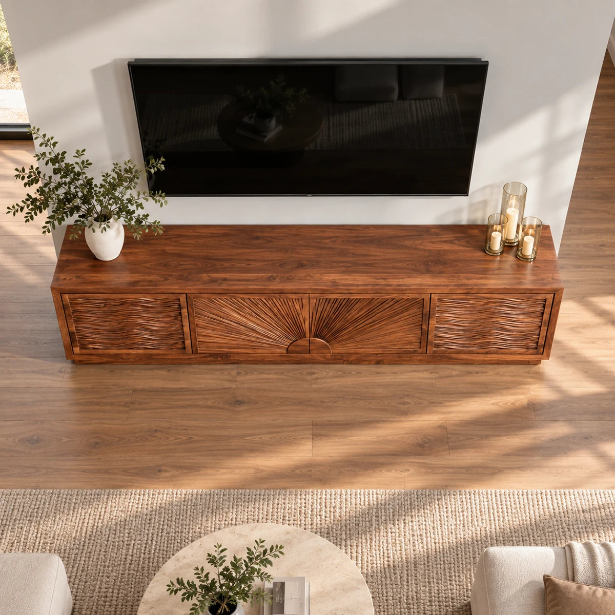 Sleek TV cabinet in solid wood with carved detail and a wide low silhouette form

