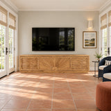 Minimalist media unit in solid wood with decorative doors and hidden storage space
