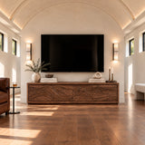 Solid wood TV stand with carved wave front and low-profile living room storage base
