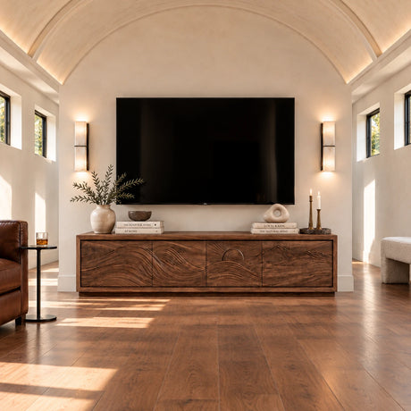 Solid wood TV stand with carved wave front and low-profile living room storage base
