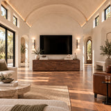 Modern media console in solid wood with scenic relief doors and a wide silhouette
