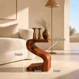 Minimalist side table with sweeping support and compact profile for elegant interiors