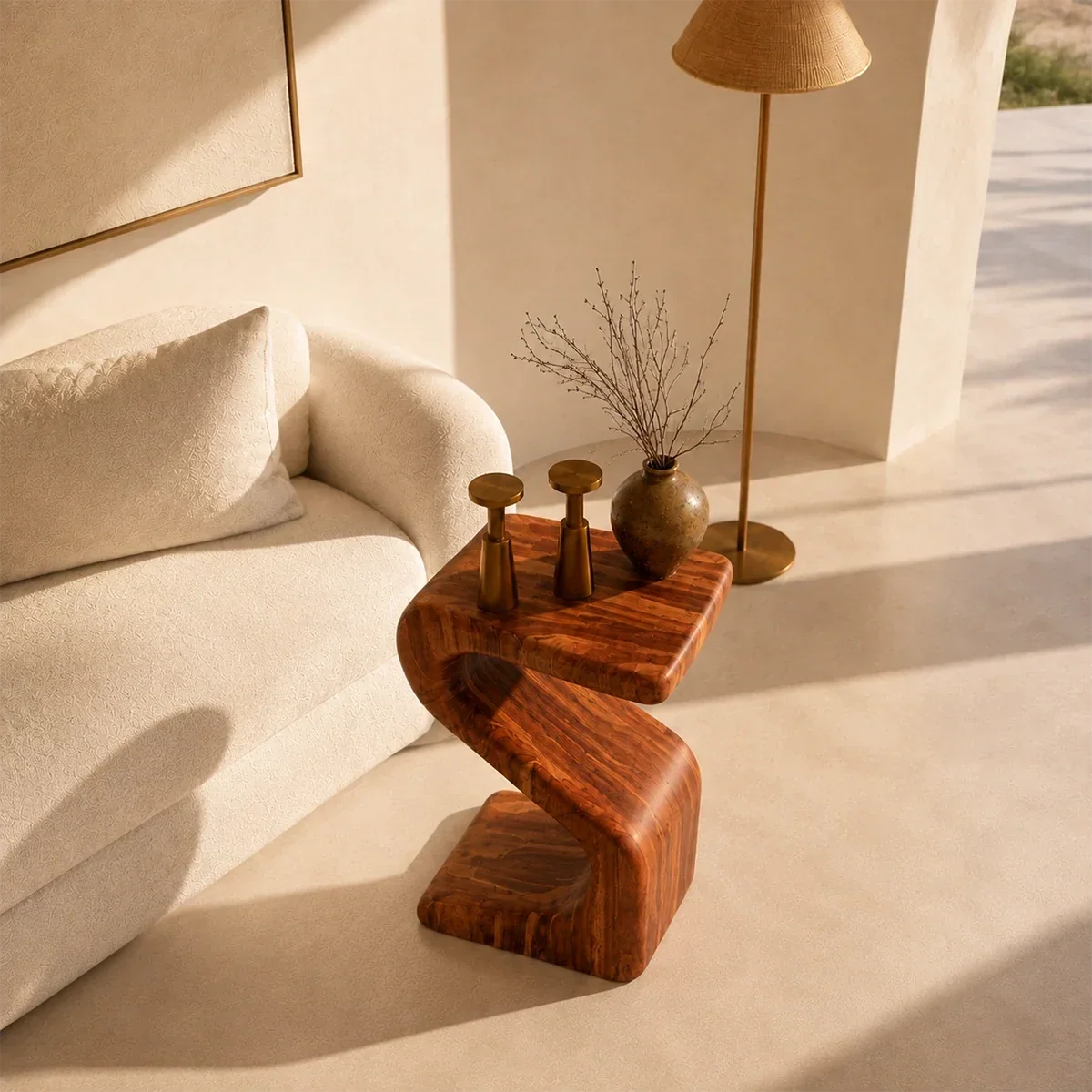Curved side table adds fluid character and practical surface to serene home interiors