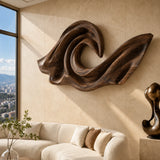 Flowing carved wall decor creates architectural interest across a spacious lounge setting