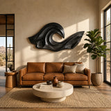 Artistic wall sculpture with carved curves enhances a calm refined interior atmosphere