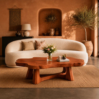 Modern coffee table featuring a freeform top and open sculptural base for refined rooms