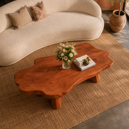 Designer coffee table with sculpted curves and solid wood framework for elegant interiors
